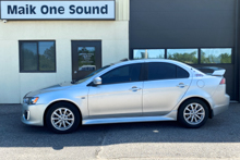 Silver 2017 Mitsubishi Lancer with sleek dark window tint